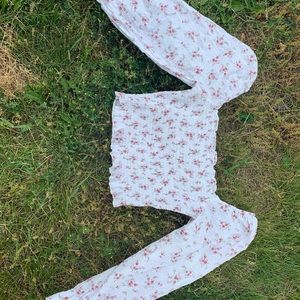 cropped, flow sleeved, floral print top.